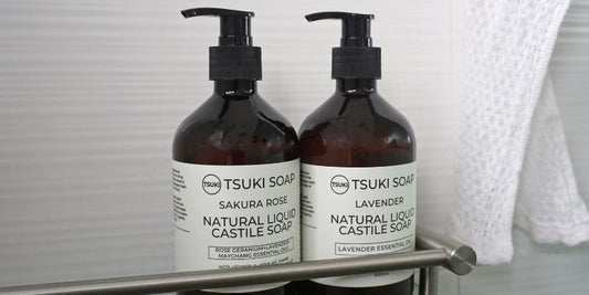Natural Handmade Castile Soap. 2 bottles in the shower. Sakura Rose Castile Liquid Soap and Lavender Castile Liquid Soap. Gentle and mild natural handmade castile soaps that are great for your skin.