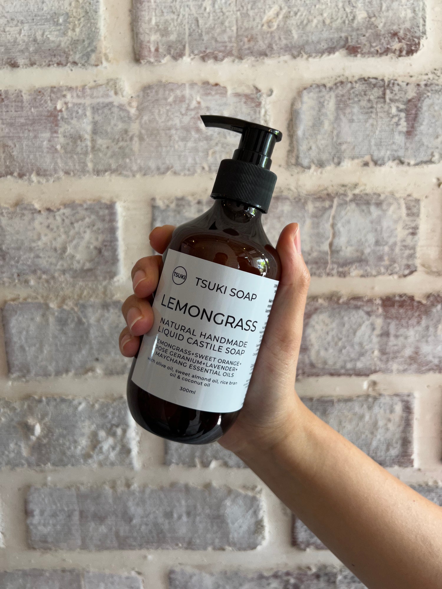 lemongrass liquid castile soap in hand