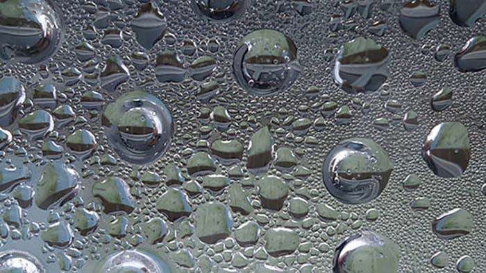 Water droplets to explain why natural handmade soaps sweat and how to handle it.